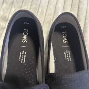 TOMS Classic Black Canvas Slip-Ons